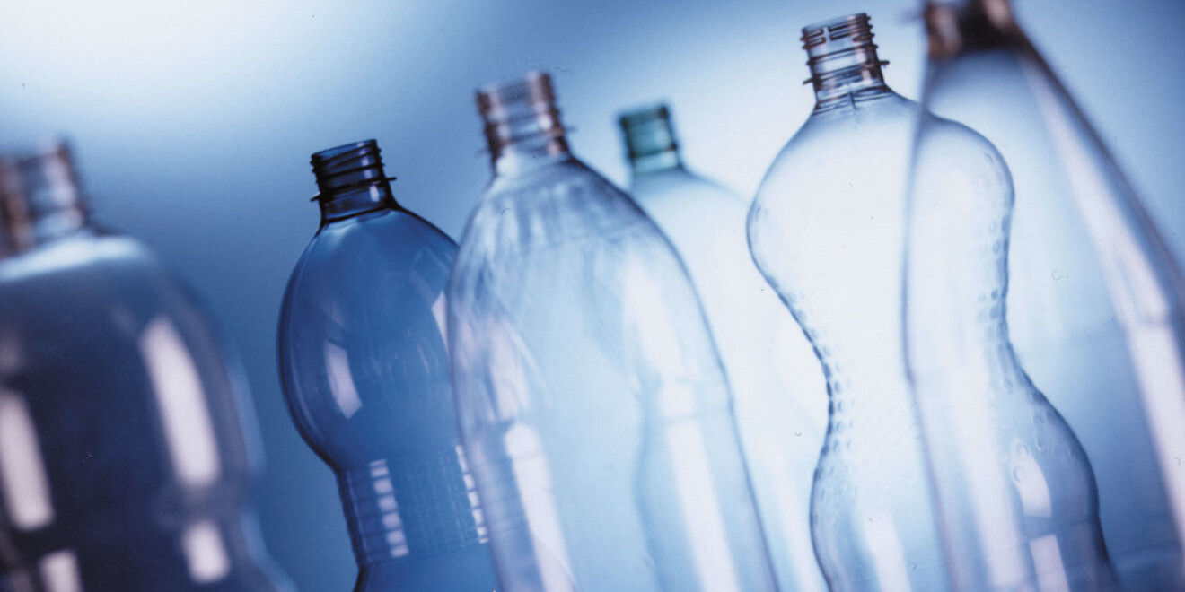 Empty PET bottles lined up next to each other